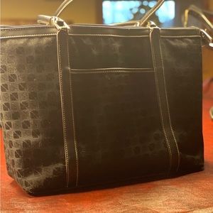 Black leather shoulder bag. Mercona